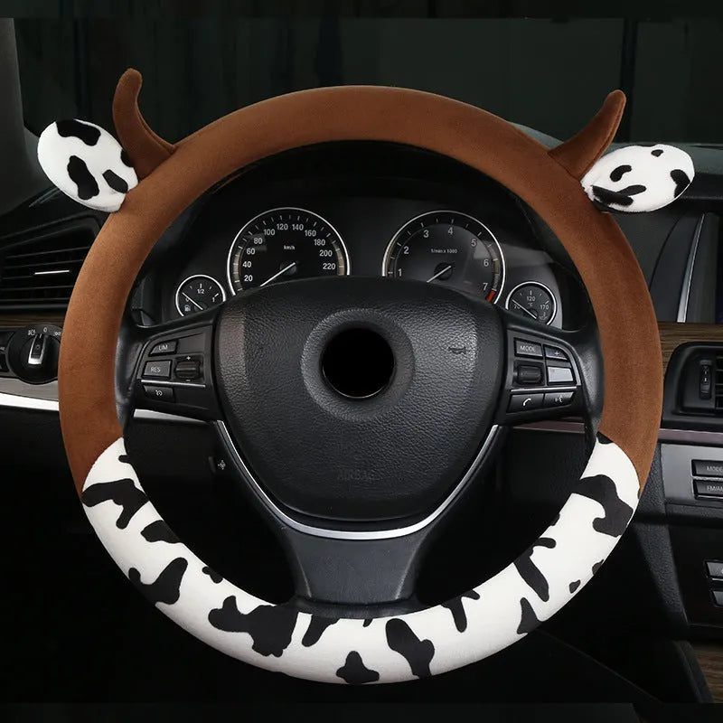Short plush automotive steering wheel cover in black with protective handle, 38cm diameter