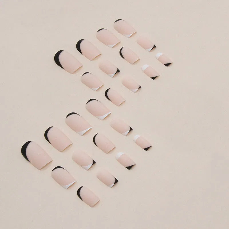 Black and white frosted artificial nails set with mandarin duck colour design