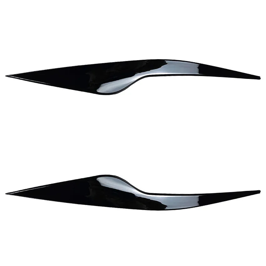 Pair of ABS plastic headlight eyebrow stickers for Ford Focus in carbon fibre pattern and piano black finish