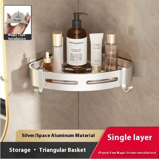 Gun grey metal fan-shaped corner bathroom shelf mounted punch-free on a wall, holding bathroom toiletries.