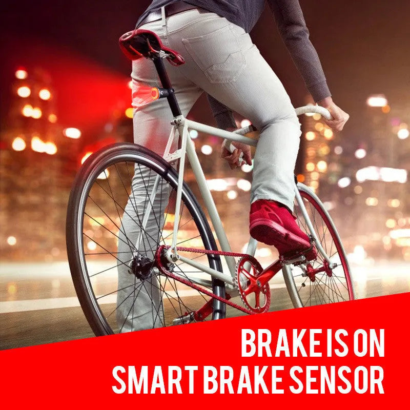 Black USB rechargeable aluminium smart brake sensing bicycle taillight showing front and side views.