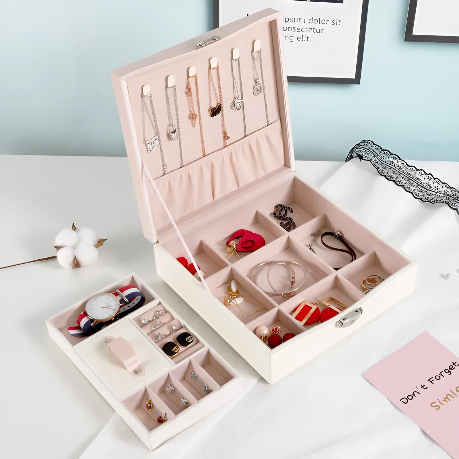 Red PU leather jewellery storage box for necklaces and rings on a dresser