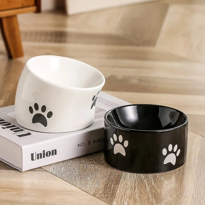 Ceramic cat food bowl with high foot and cat's paw pattern in chosen colour