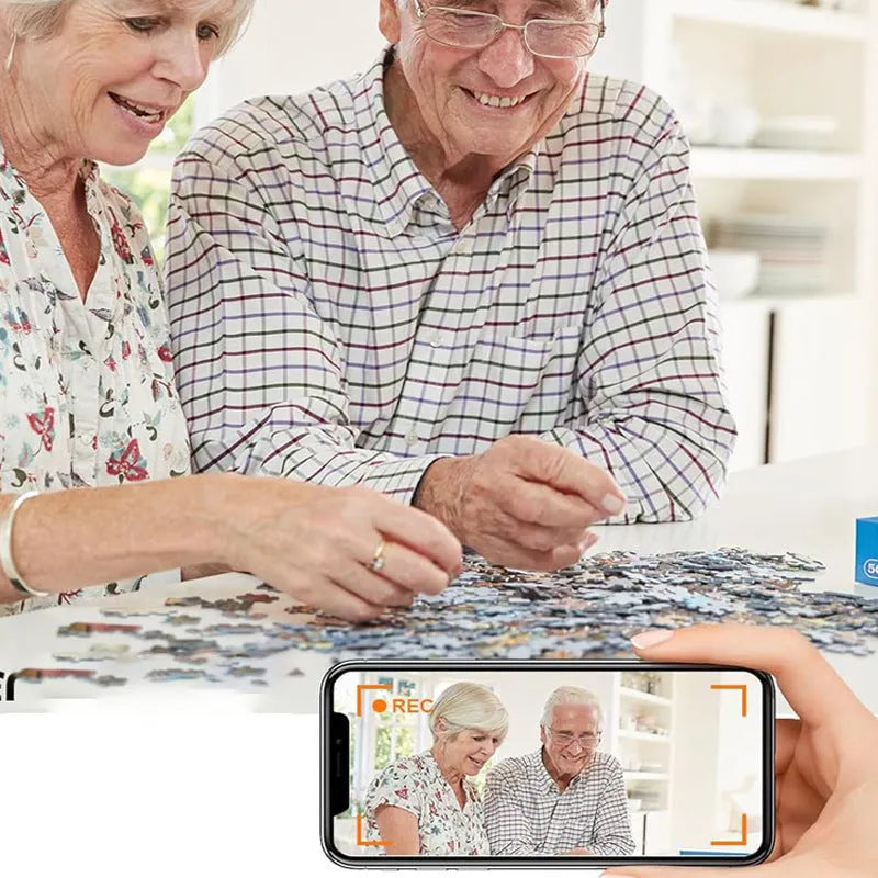 Black smart security camera with WiFi connectivity for mobile phone baby monitoring