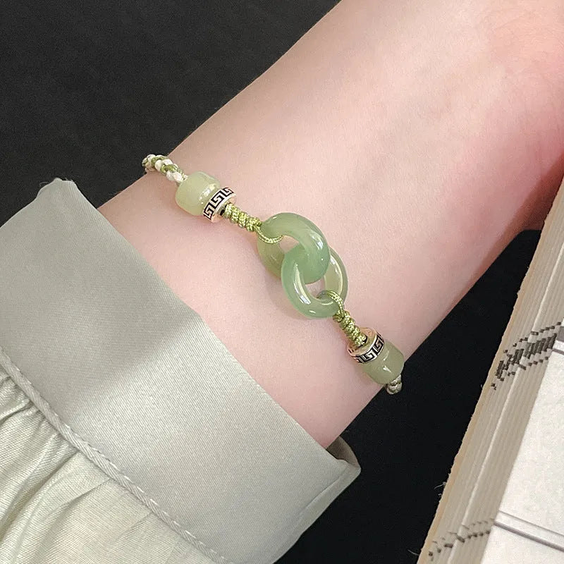 Green copper ethnic bracelet with a peace buckle and jade double rings, animal Zodiac modelling.