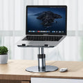 Silver adjustable car laptop stand with 360-degree rotating base on car seat