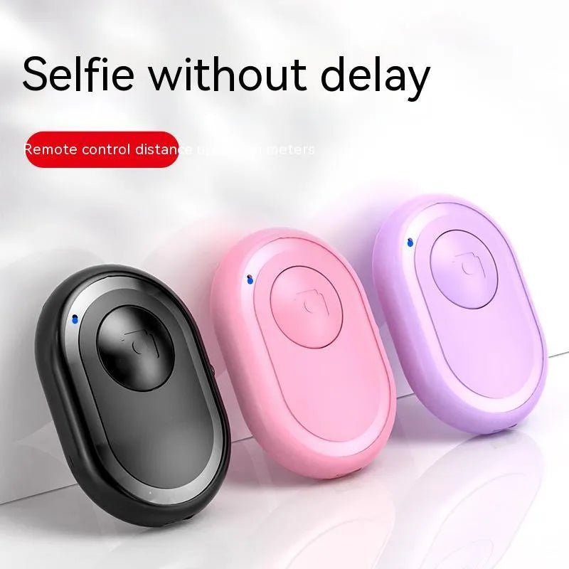 Wireless Bluetooth remote self-timer for smartphones in black, pink or purple colour options