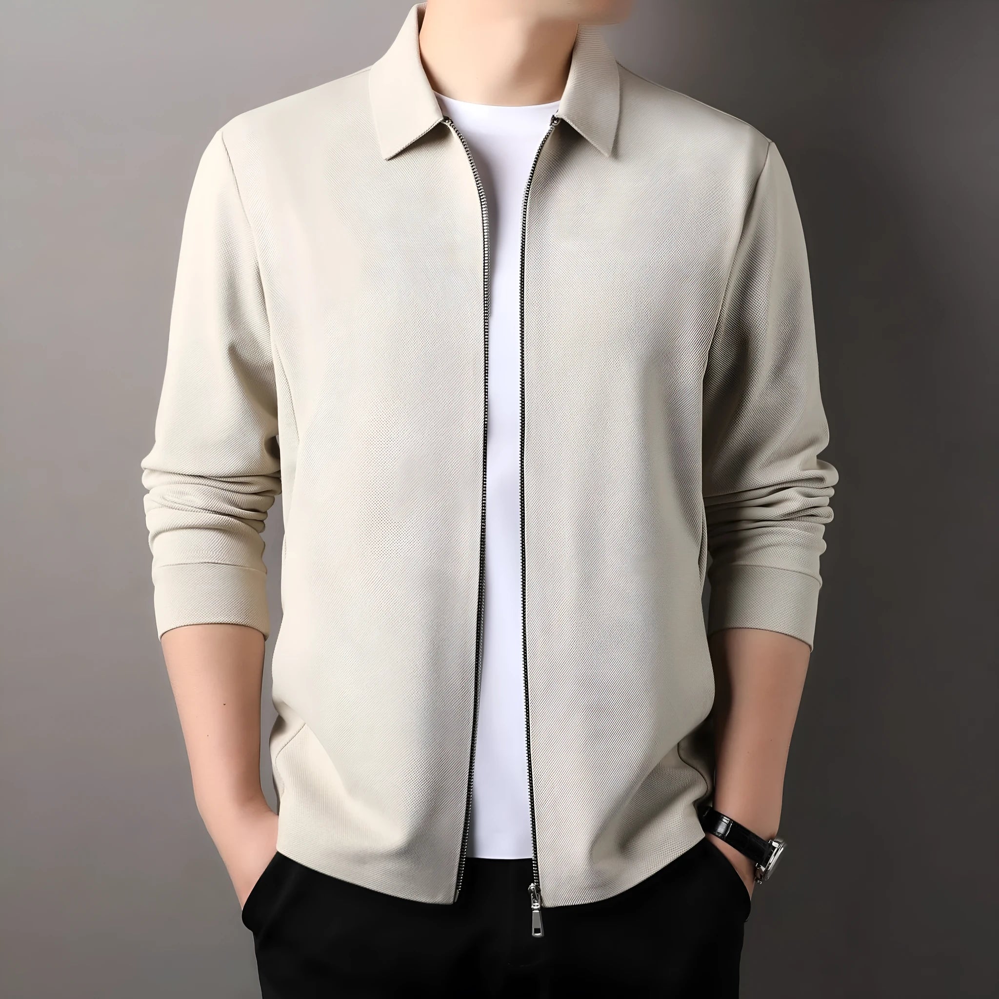 Men's black polyester jacket with long sleeves and a straight hem on a hanger.