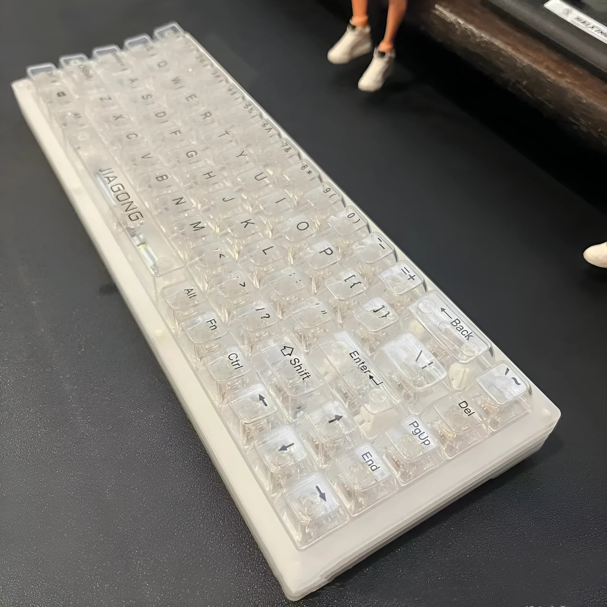 132 transparent plastic keycaps arranged as complete mechanical keyboard replacement set