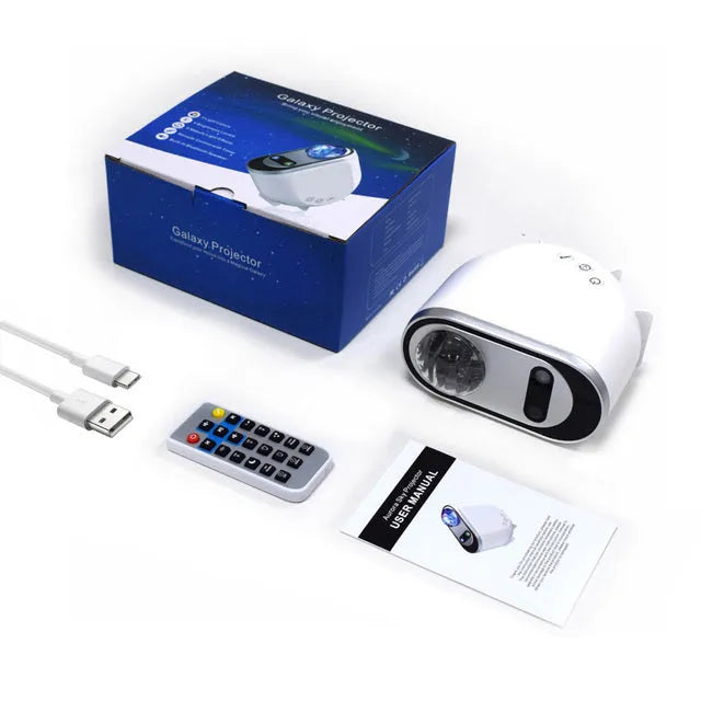 White ABS plastic Northern Lights star projector lamp with USB cable and remote control on table