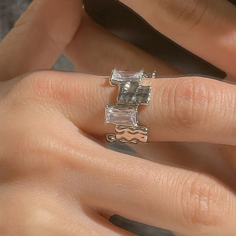 Geometric cross zircon open ring in silver tone with three-dimensional decoration