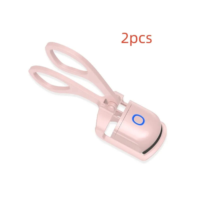 White USB rechargeable heated eyelash curler with dual temperature buttons and compact design.