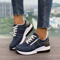 Women's casual sneakers with thick EVA outsole and synthetic leather upper in black, side view