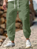 Men's straight-leg cotton trousers with elastic waistband in Army Green colour
