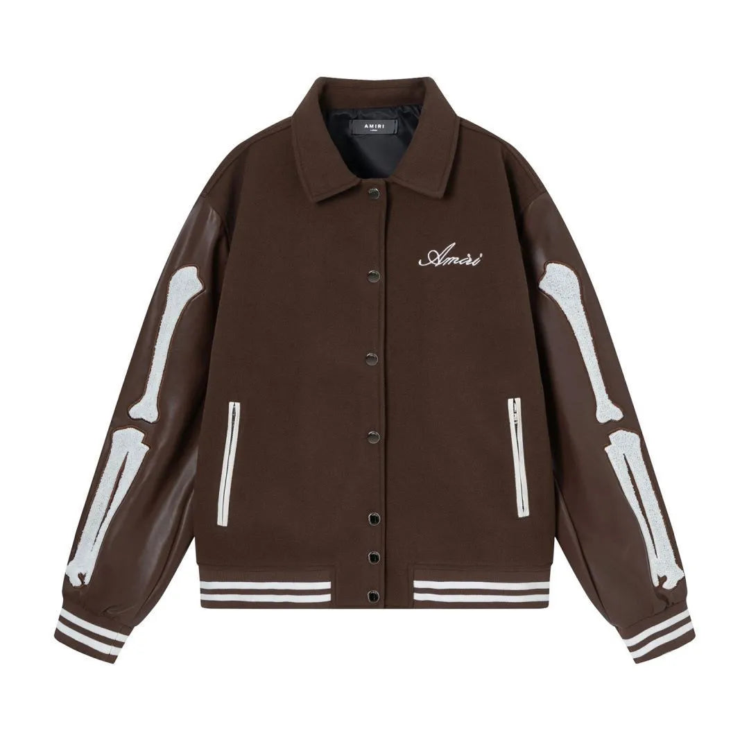 Women's apricot wool jacket with bone embroidery on the front, showing casual fit and stitch detail.