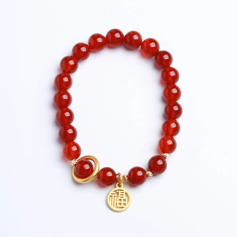 Natural red agate bracelet with hand-woven cord in national style, shown with blessing card.