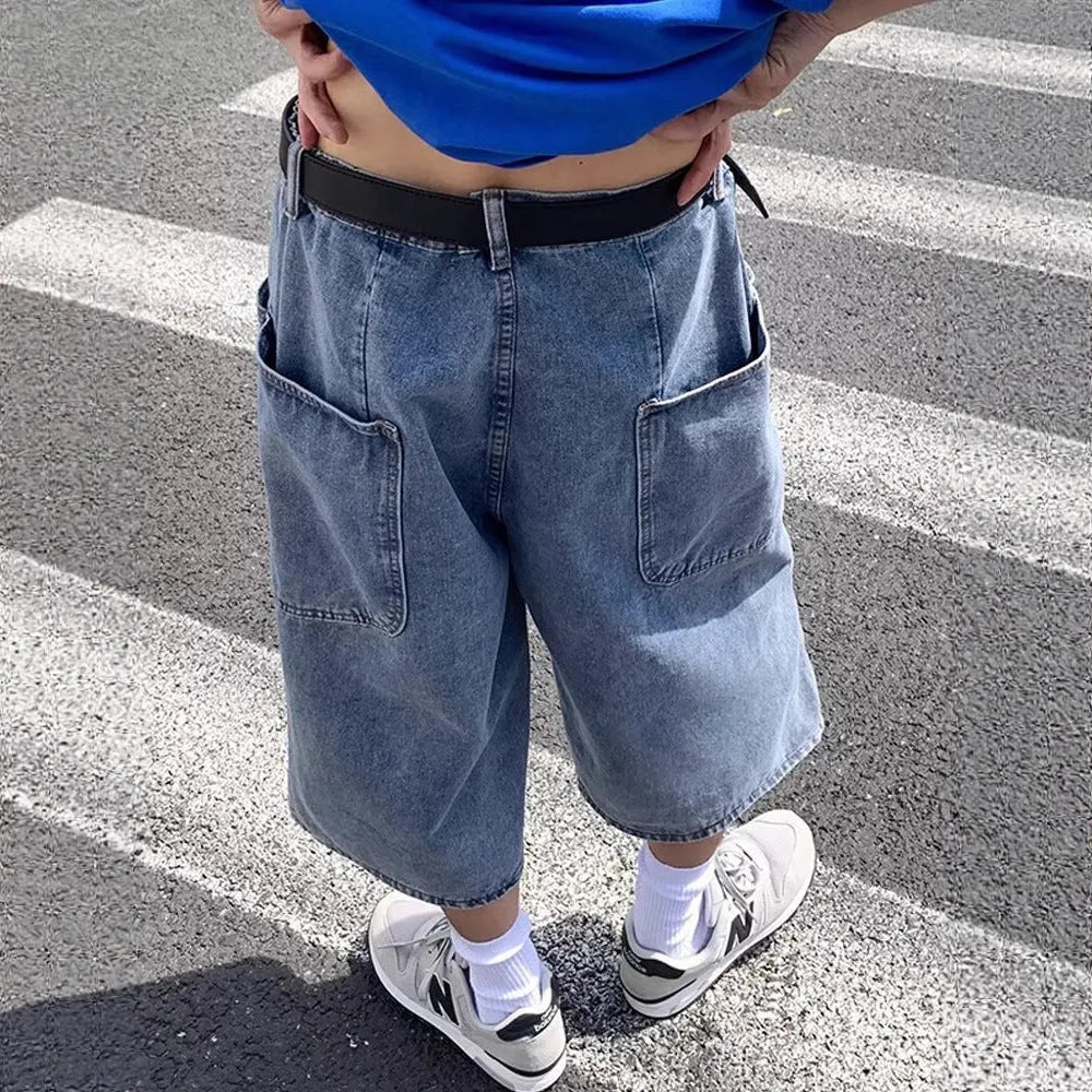 Blue men's thin denim pirate shorts with high waist and cropped straight legs on a neutral background.
