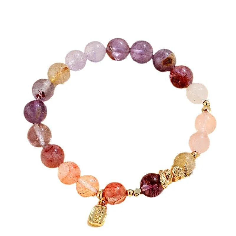 Women's lucky snake bracelet with crystal beads, plastic flowers, and a beast pattern design.