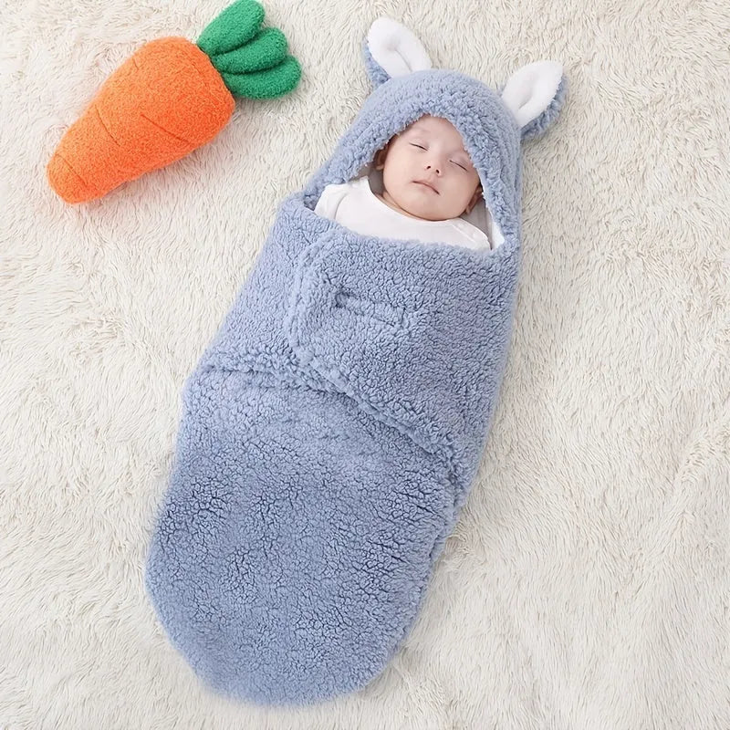 Adjustable baby sleeping bag swaddle blanket showing velcro wings and leg positioner in blue colour