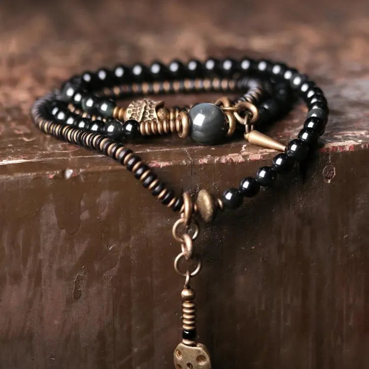 Black geometric beaded bracelet with multi-layered retro design