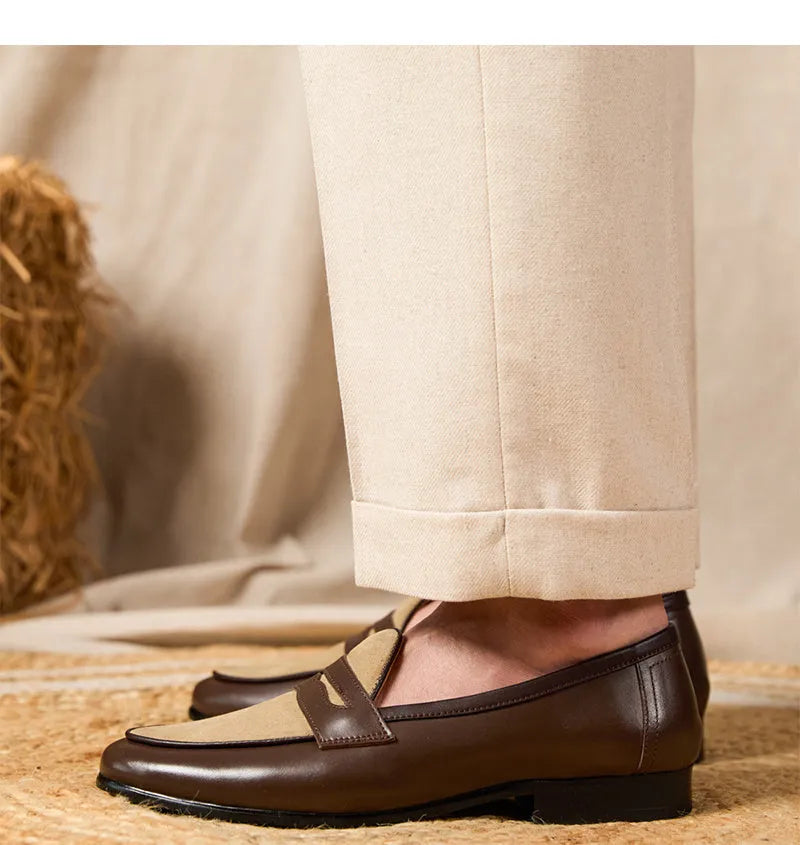 Coffee grey men's suede loafers with high-gloss finish and rubber sole on a plain background.