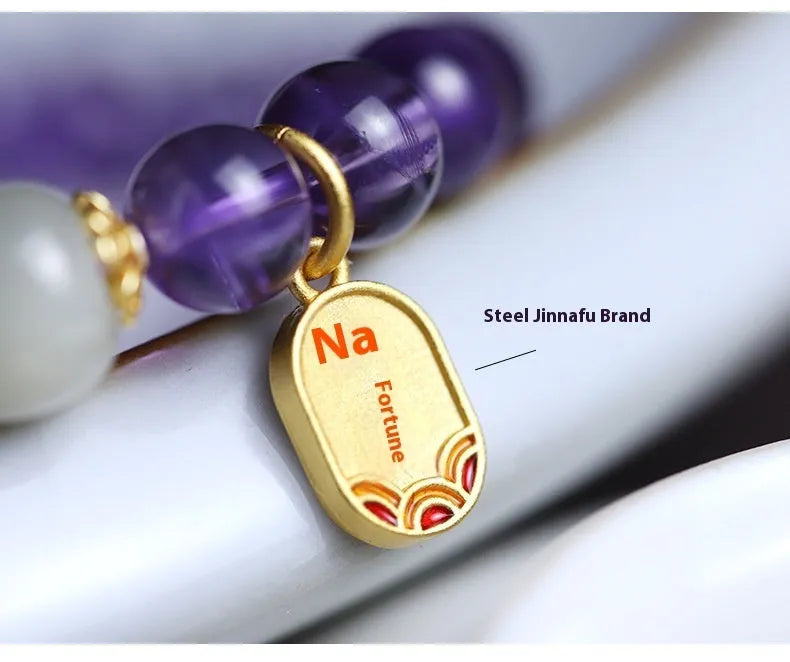 Amethyst purple crystal bracelet with 8mm geometry-shaped beads on wrist