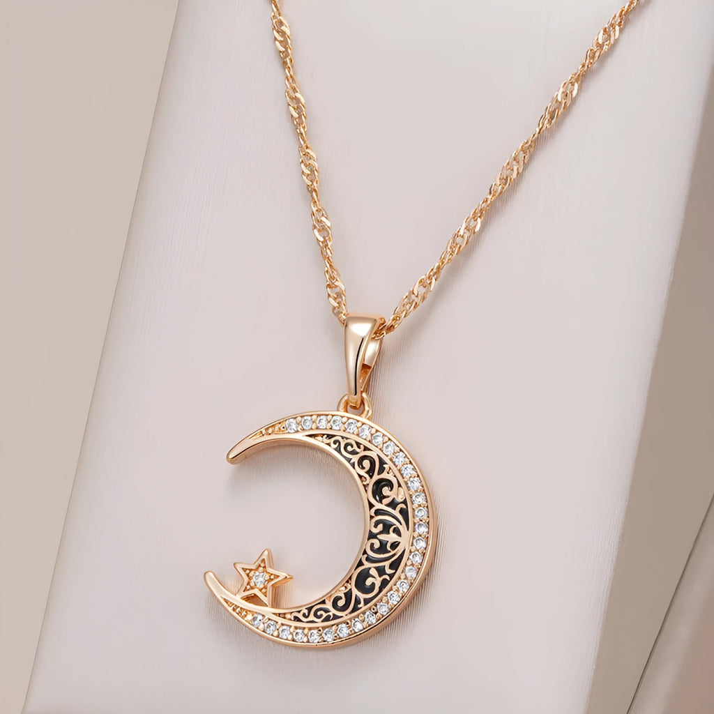 Rose gold star moon necklace with adjustable water wave chain showing zircon and enamel pendant details