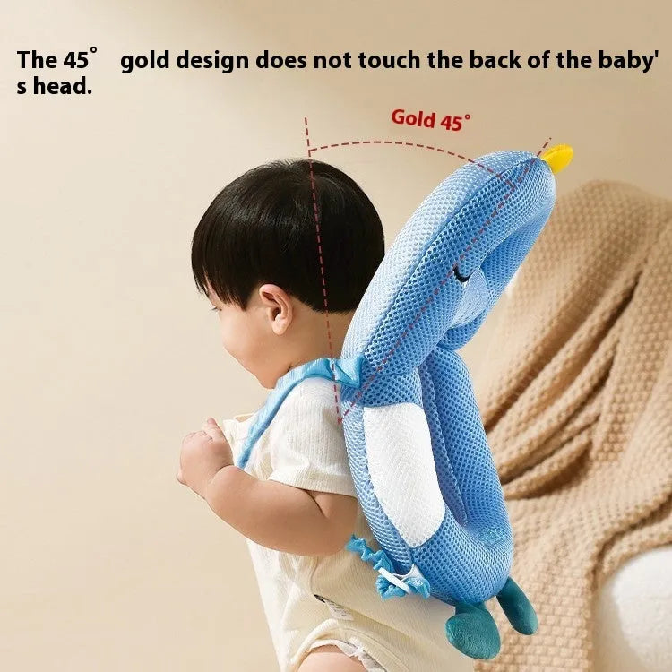 Baby wearing cartoon dinosaur anti-collision pillow for toddler fall protection