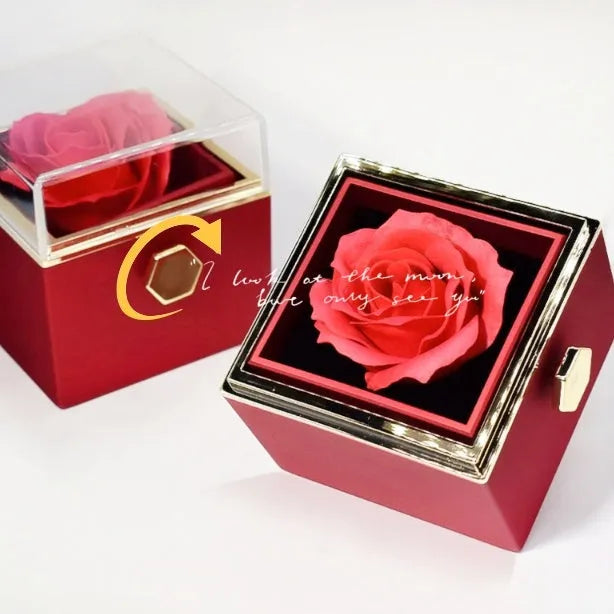 Rotating rose jewellery gift box with preserved real flower under acrylic cover and rotating drawer