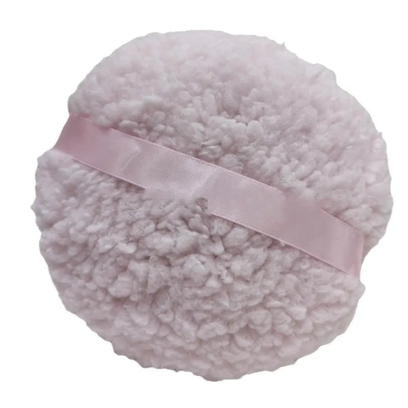 Large rectangular plush powder puff for makeup in pink, white, and skin colour options.