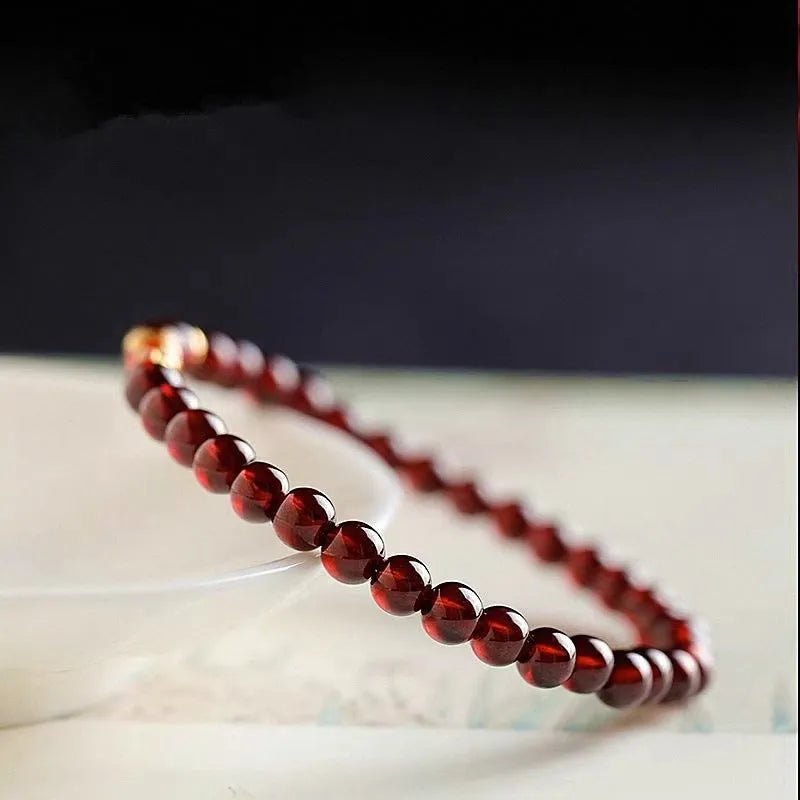 Retro wine red glass bead women's bracelet with garnet accents in New Chinese style design