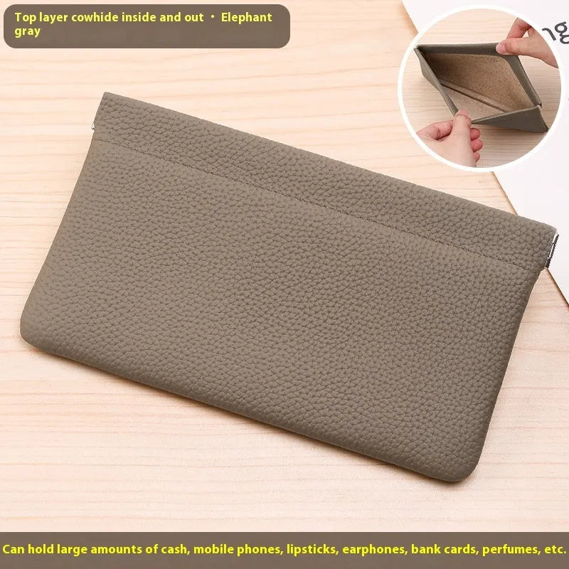 Self-closing first layer cowhide long wallet in solid colour with genuine leather finish