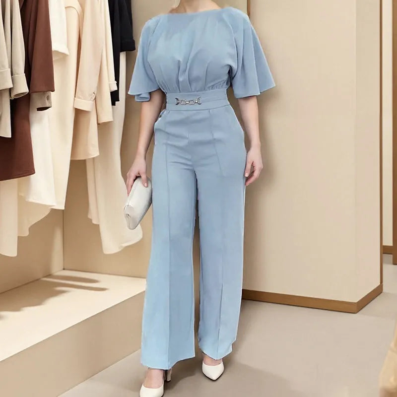 Men's blue two-piece polyester suit with long-sleeve jacket and trousers on hanger