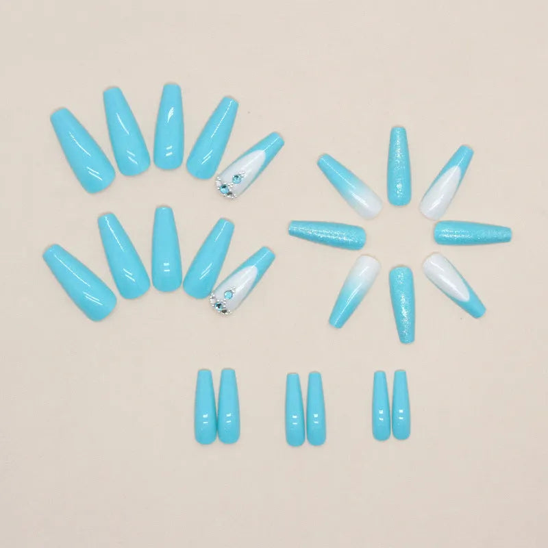 Solid colour long ballet false nails with blue diamond glitter and adhesive glue