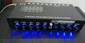 Black car audio equaliser amplifier with frequency control knobs and compact 18.5cm design