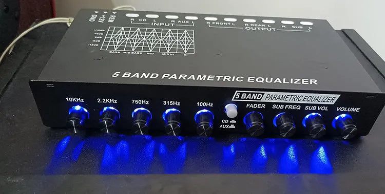 Black car audio equaliser amplifier with frequency control knobs and compact 18.5cm design
