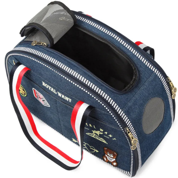Blue denim pet diaper bag with cartoon pattern measuring 43x20x30cm