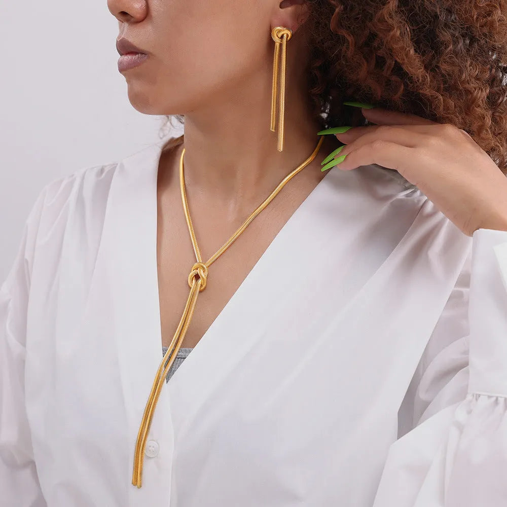 Gold knotted tassel snake chain long necklace and matching earrings set for women