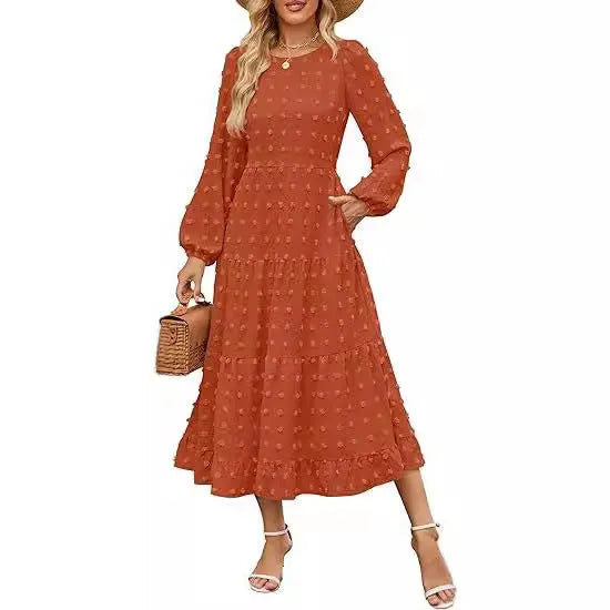 Women's long sleeve high waist dress with ruffled sleeves in a solid colour.