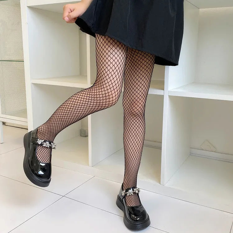 Women's mesh stockings showing large, medium, and small net patterns in black and white colours