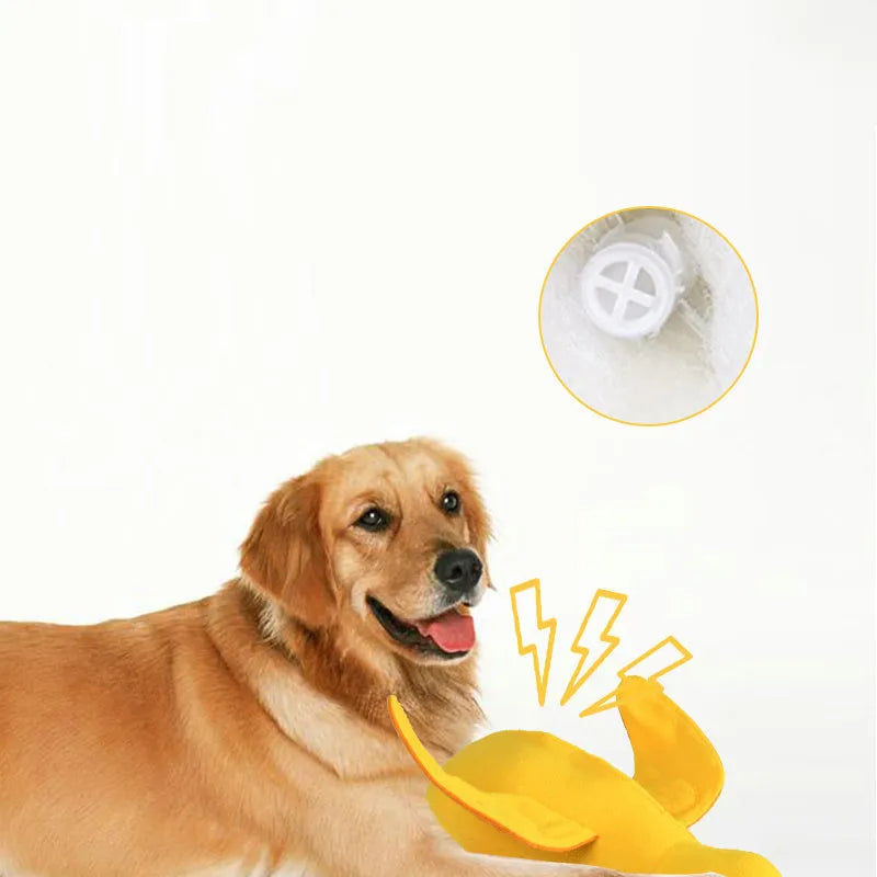 Yellow plush teddy bear dog toy with an attached duck doll, featuring a squeaker and treat compartment.