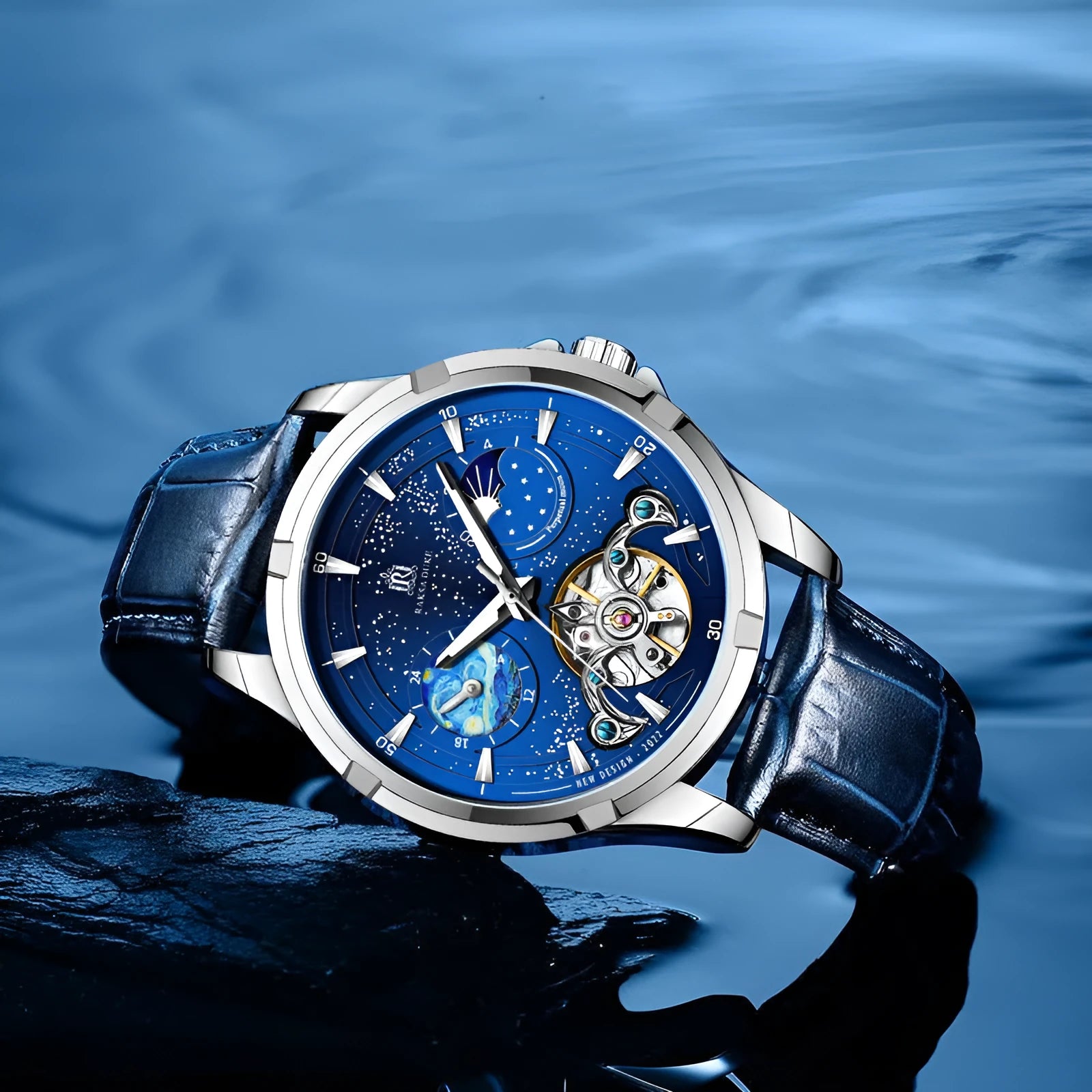 Blue dial men's automatic mechanical watch with a substantial 14mm thick case on a wrist.