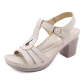 Women's patent leather thick high heel sandals with metal buckle stitching in apricot colour