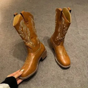 Brown women's mid-calf Martin boots with embroidery and a square low heel.