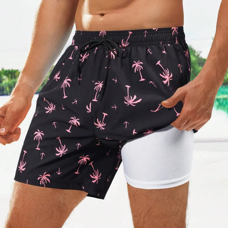 Men's loose green floral print boxer swimming trunks made from quick-drying spandex fabric.