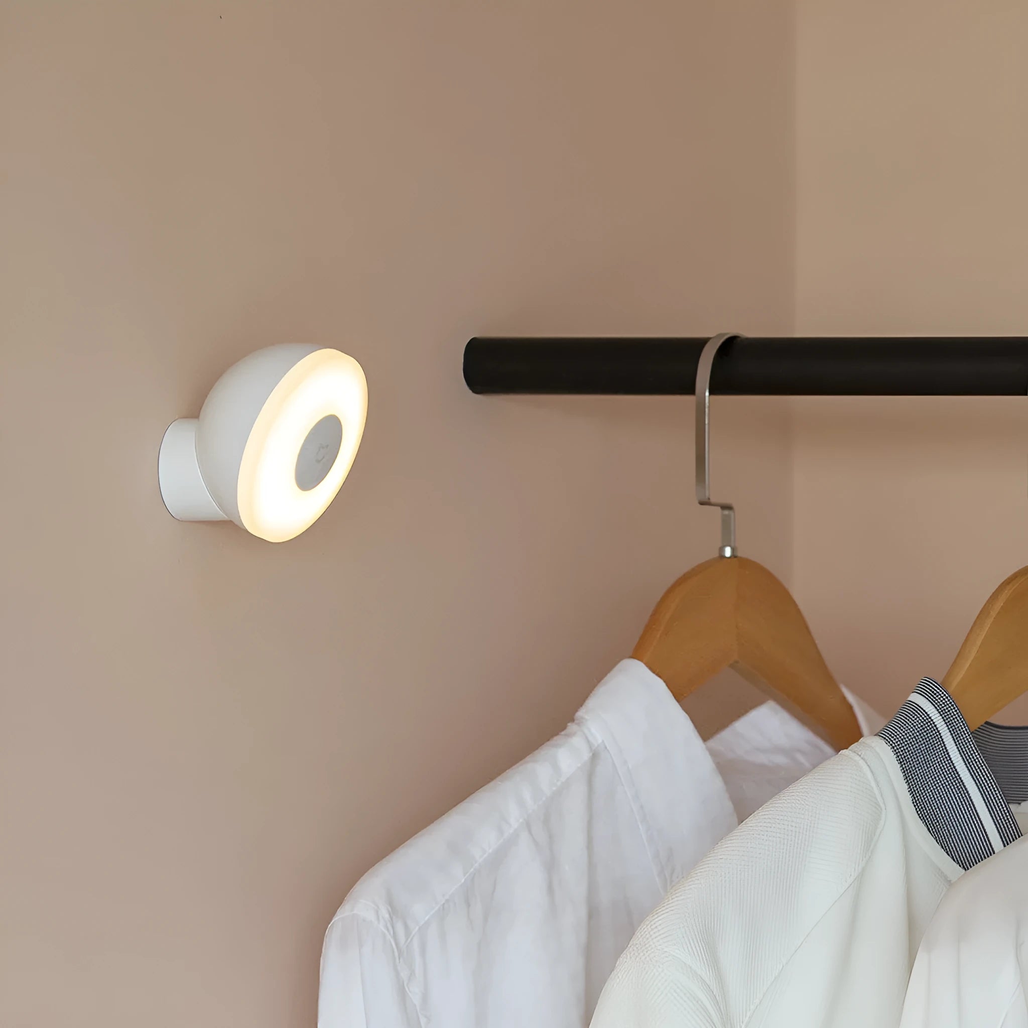 White modern bedside table lamp with sensor and Bluetooth on a wooden nightstand.
