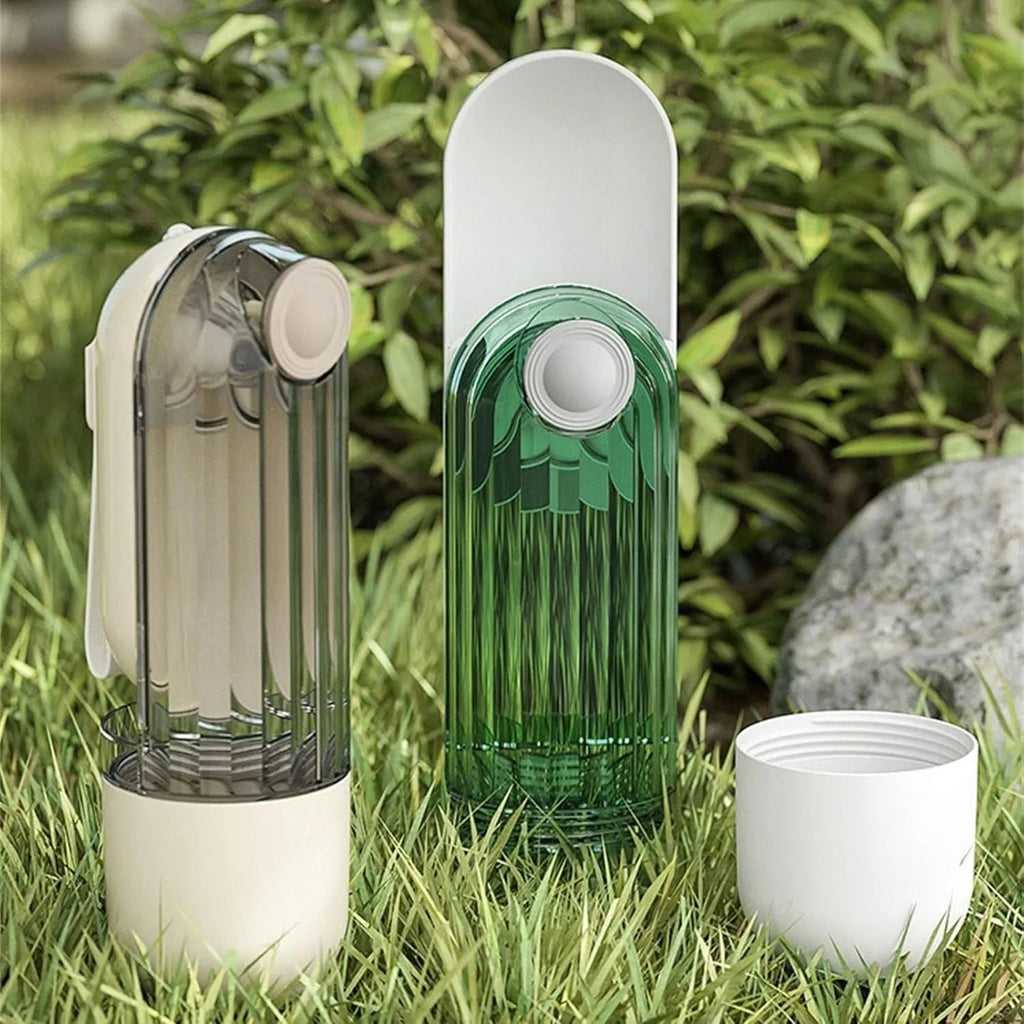 Foldable dog water bottle with food dispenser in beige or green colour for walking and hiking