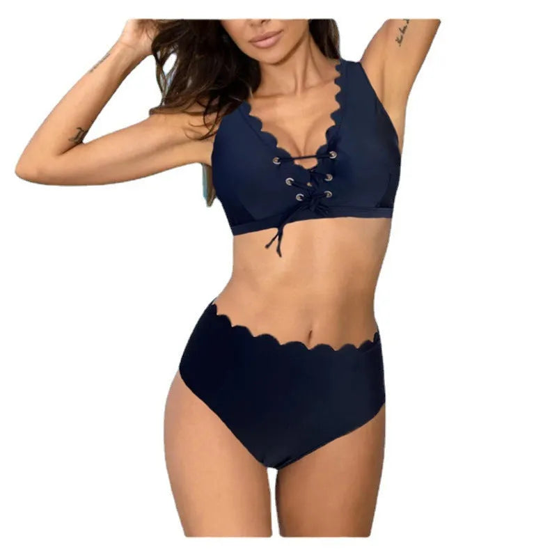 Women's high-waisted split swimsuit in polyester fabric available in red, black and blue colours