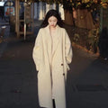 Women's woolen coat with lapel collar and long sleeves in black colour