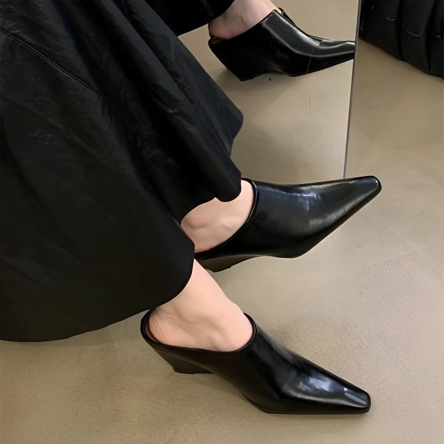 Women's Wind Wedge closed toe half slipper in PU leather, showing wedge heel design.